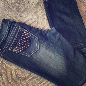 Antique Rivet dark distressed bootcut studded jean